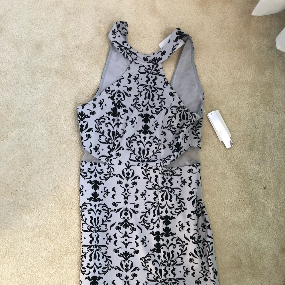 Blue and black dress with leg slit and mesh cutout